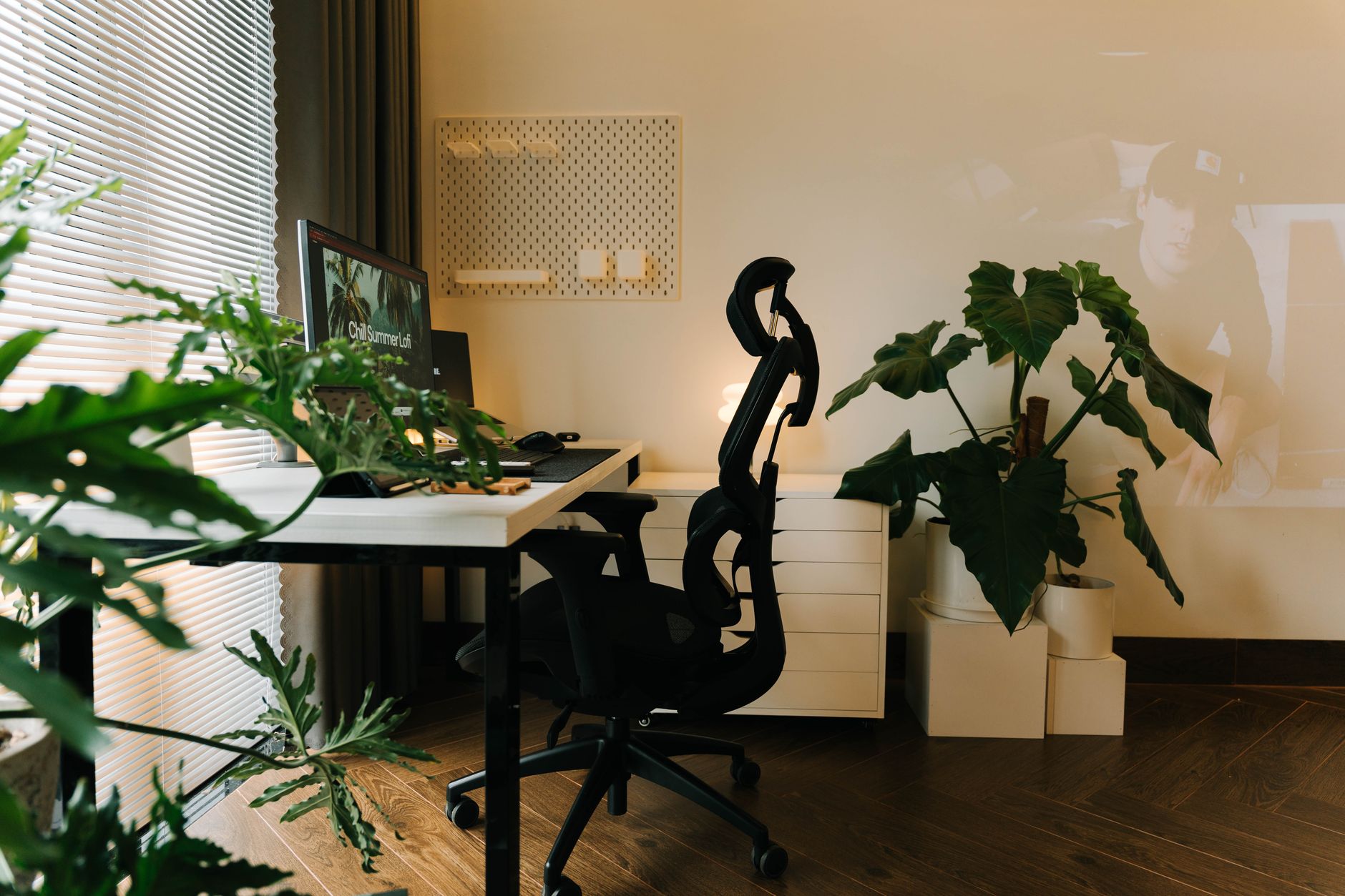 Sample palettes and floorboards fanned across a design desk